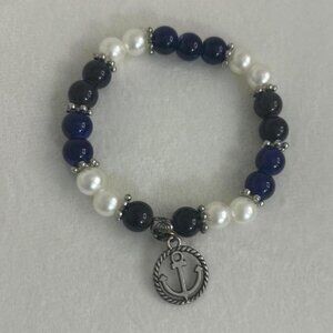 Navy and white nautical themed bracelet with anchor charm #nauticalvibes